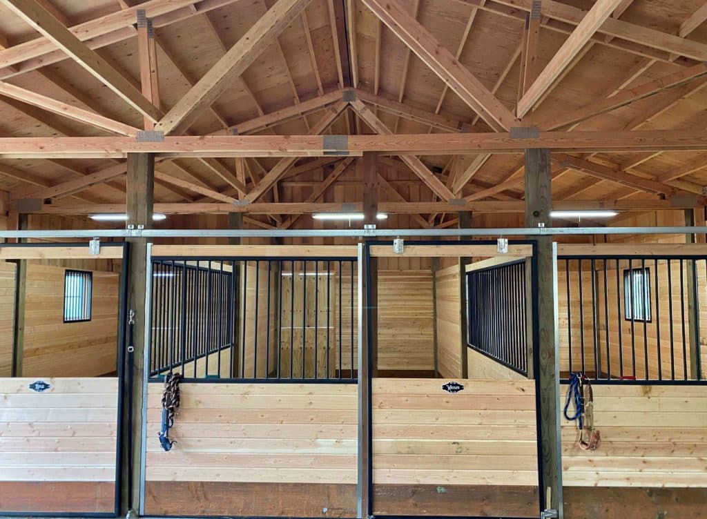 Pole barn riding arena with horse stalls built by Locke Buildings